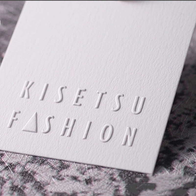 Custom Luxury Garment Swing Tag Clothing Brand Price Label 3D Embossed logo Paper hang Tag