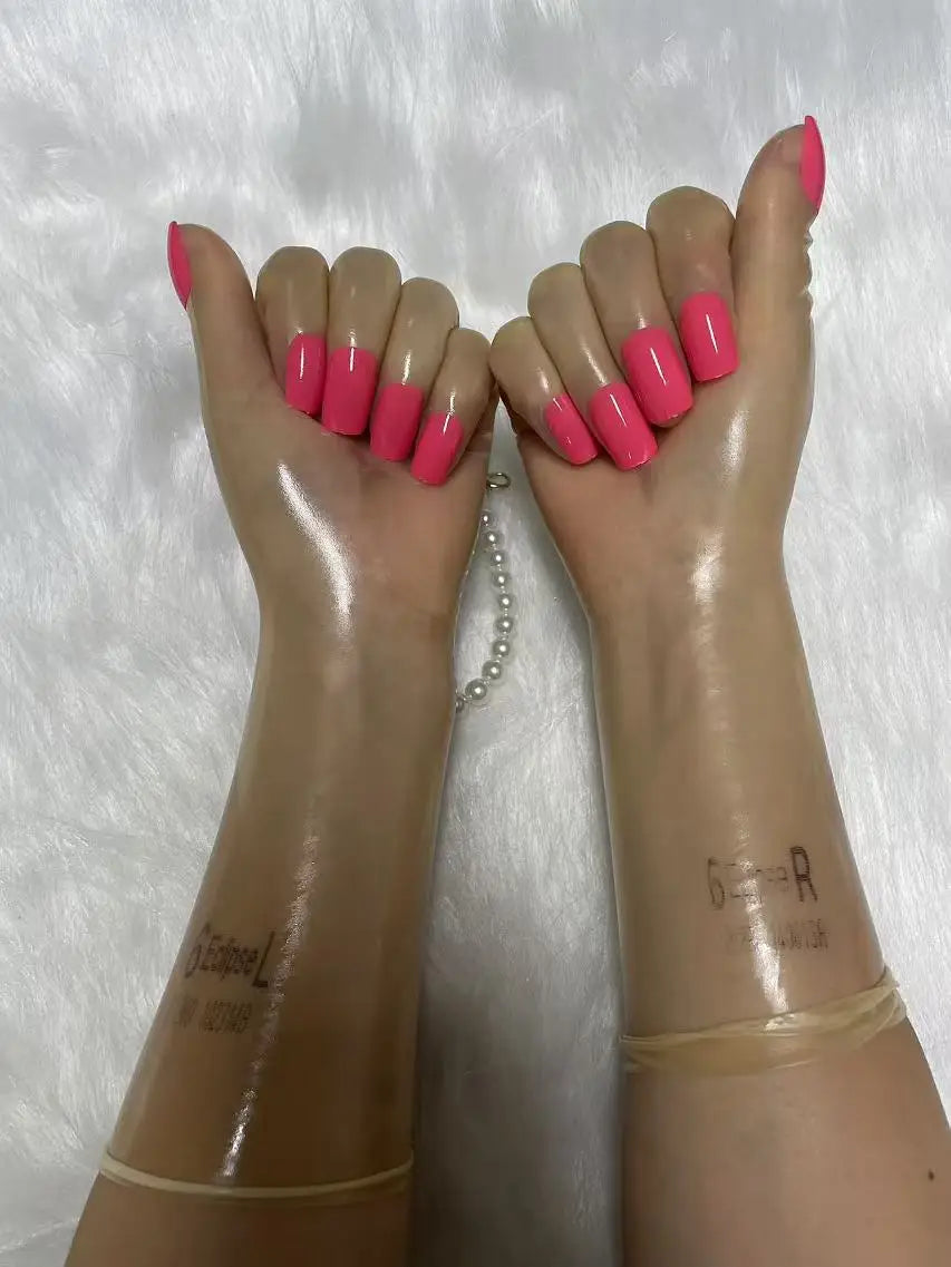 A pair of Malaysian latex material supper thin transparent shiny shiny male to female latex medium long gloves with nail service