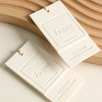 Custom Luxury Garment Swing Tag Clothing Brand Price Label 3D Embossed logo Paper hang Tag
