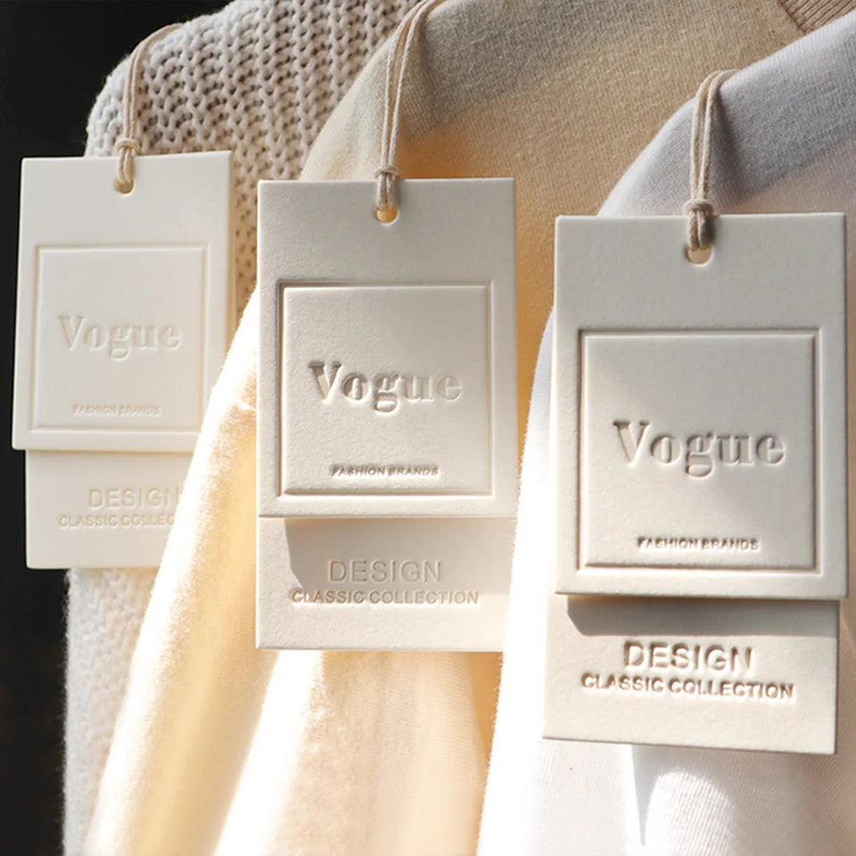 Custom Luxury Garment Swing Tag Clothing Brand Price Label 3D Embossed logo Paper hang Tag