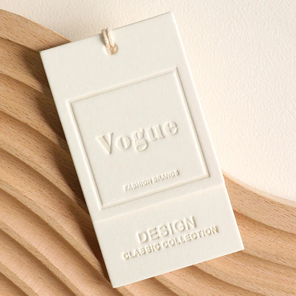 Custom Luxury Garment Swing Tag Clothing Brand Price Label 3D Embossed logo Paper hang Tag