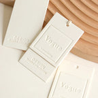 Custom Luxury Garment Swing Tag Clothing Brand Price Label 3D Embossed logo Paper hang Tag