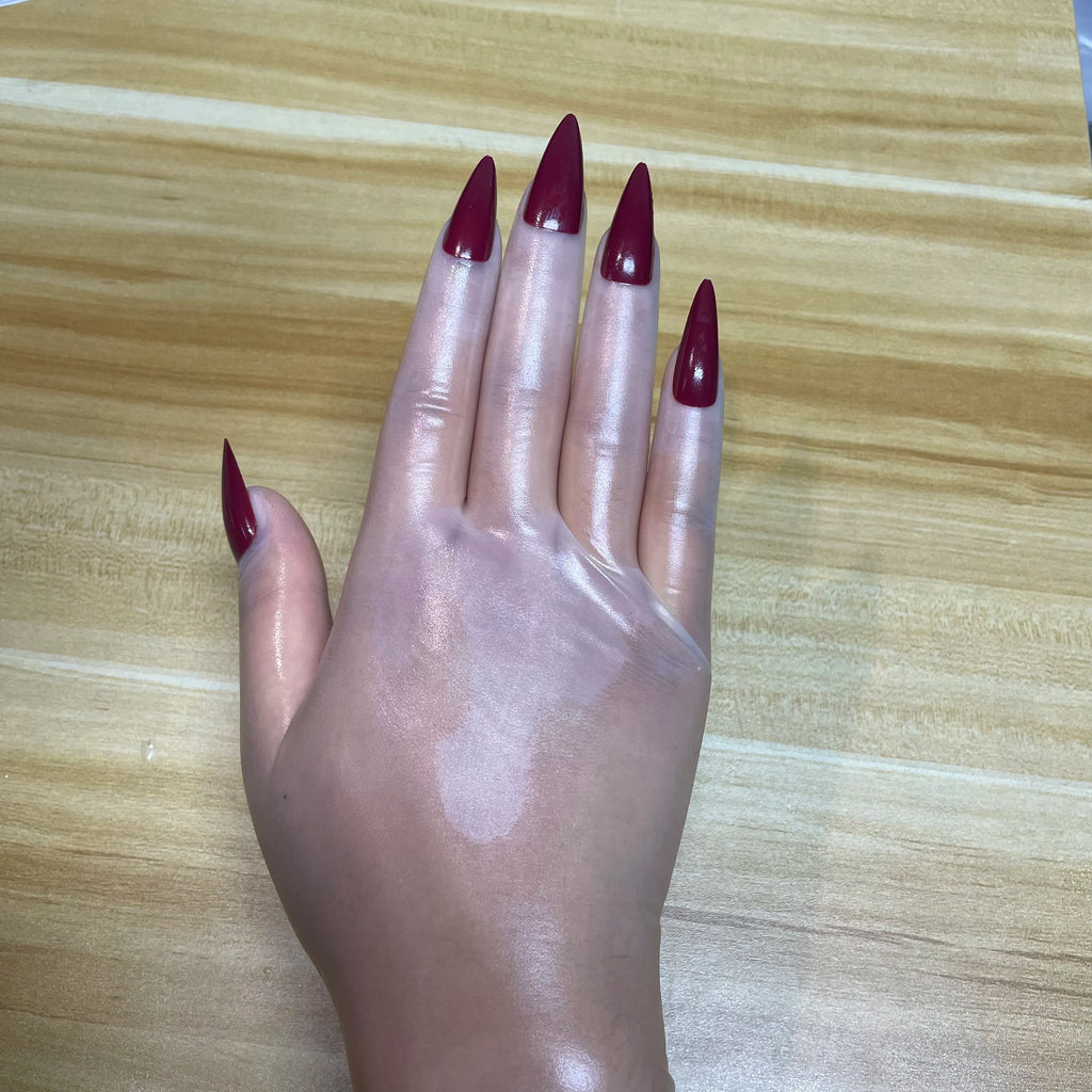 A pair of Malaysian latex material supper thin transparent shiny shiny male to female latex medium long gloves with nail service