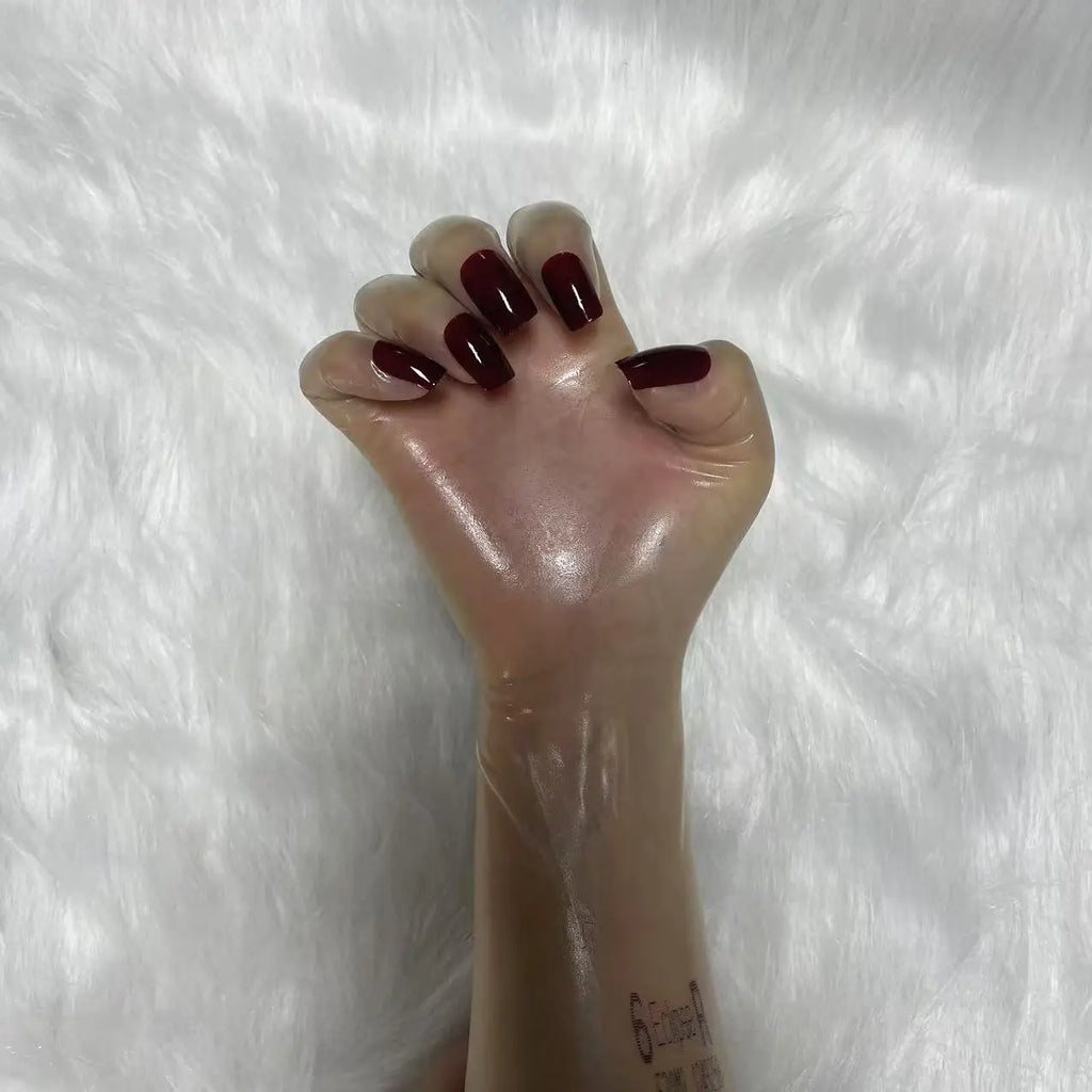 A pair of Malaysian latex material supper thin transparent shiny shiny male to female latex medium long gloves with nail service
