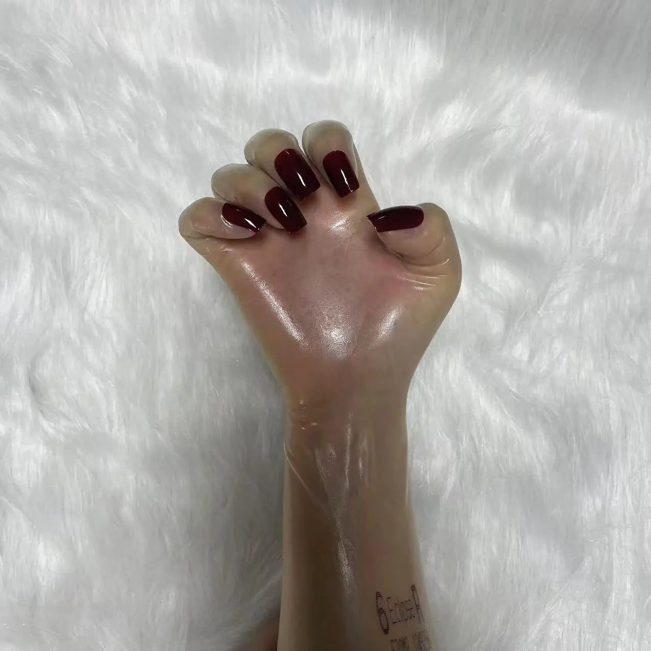 A pair of Malaysian latex material supper thin transparent shiny shiny male to female latex medium long gloves with nail service