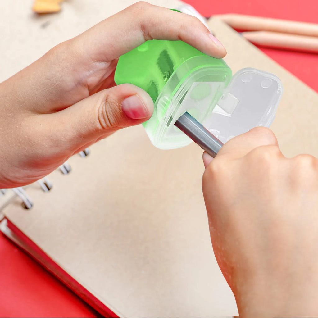 A color random student two-hole pencil sharpener for children's school supplies - a must-have for starting school