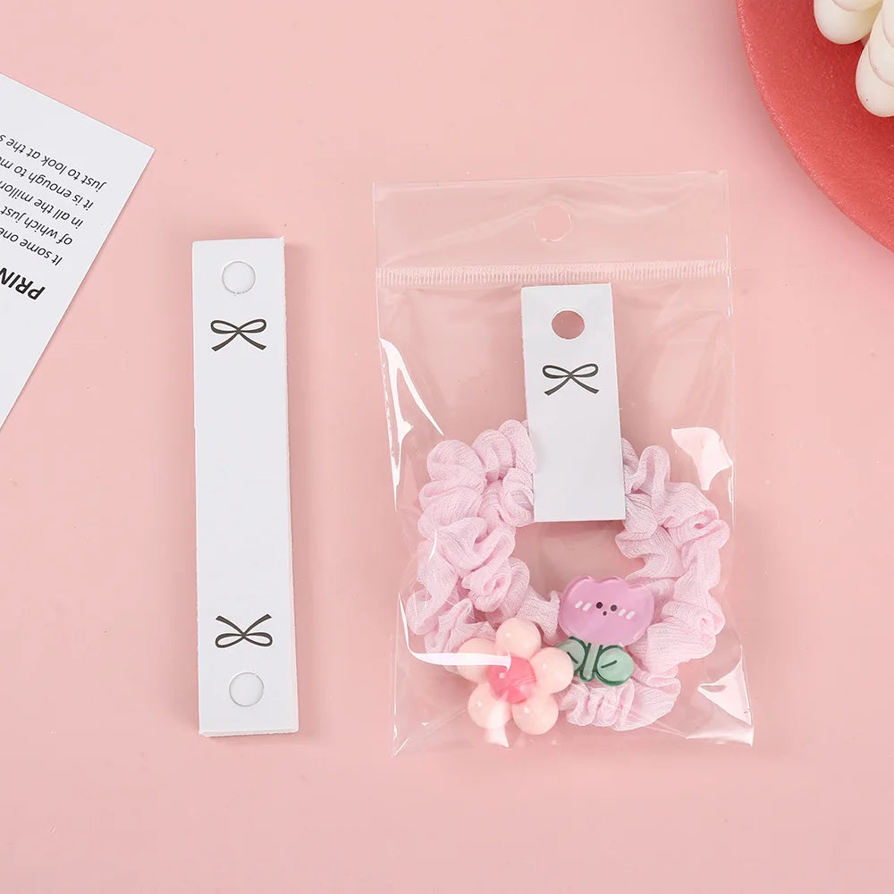 50pcs 2x11cm White black Bow Cards Hang Tags HairRope Price Label for DIY Jewelry Necklace Bracelet Packaging Retail Card