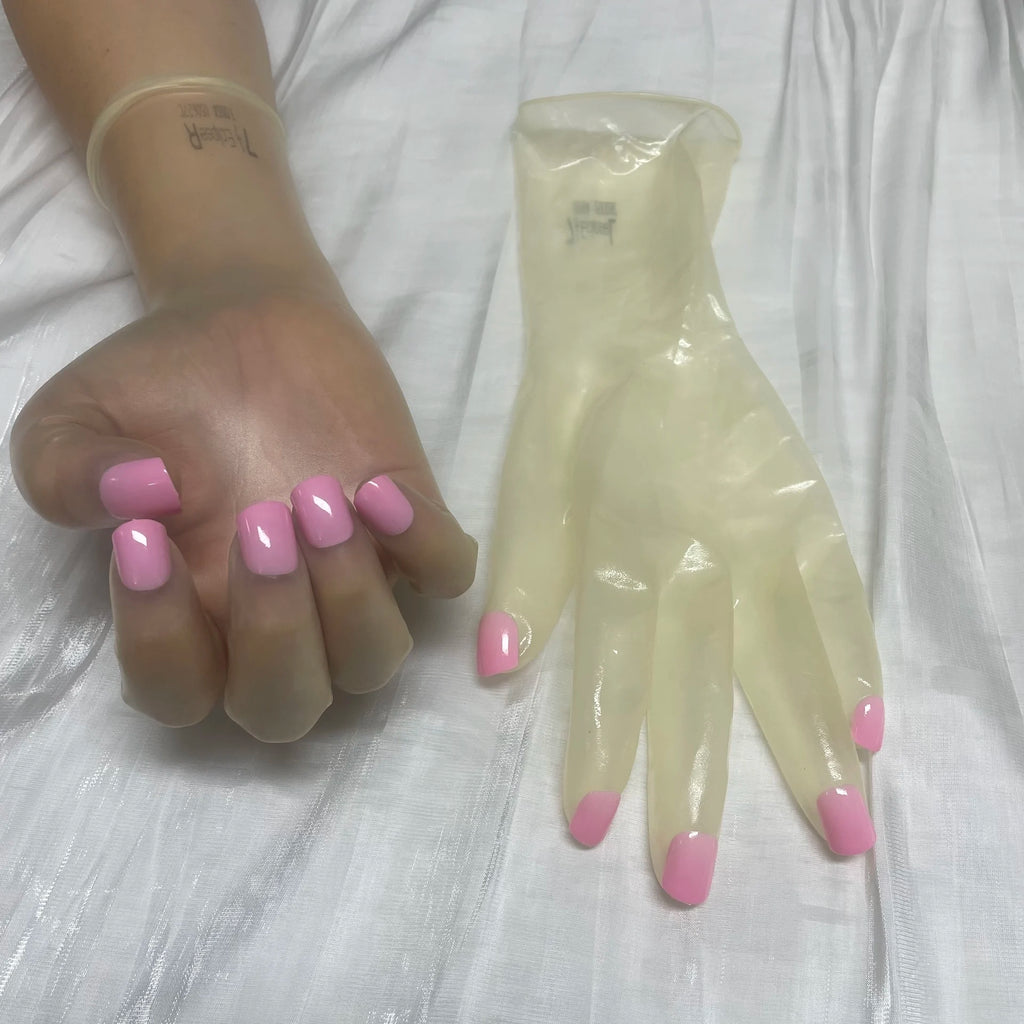 A pair of Malaysian latex material supper thin transparent shiny shiny male to female latex medium long gloves with nail service