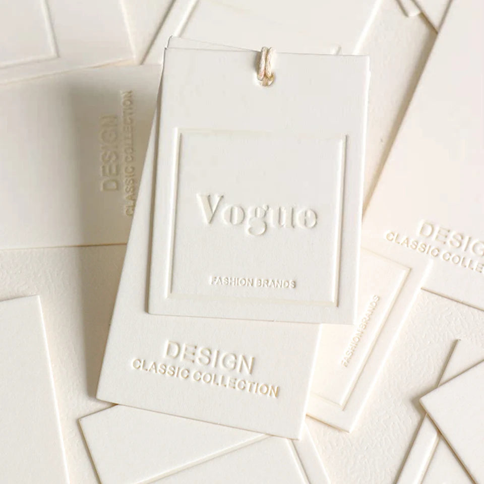 Custom Luxury Garment Swing Tag Clothing Brand Price Label 3D Embossed logo Paper hang Tag