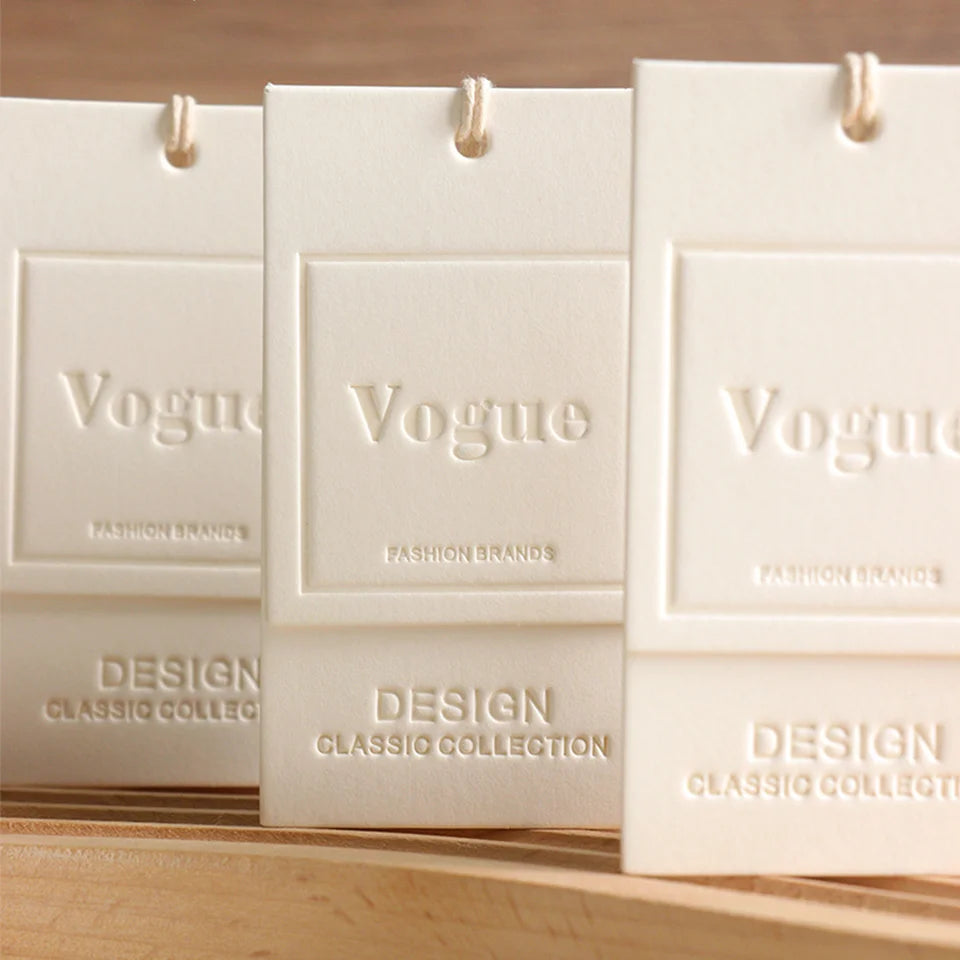 Custom Luxury Garment Swing Tag Clothing Brand Price Label 3D Embossed logo Paper hang Tag