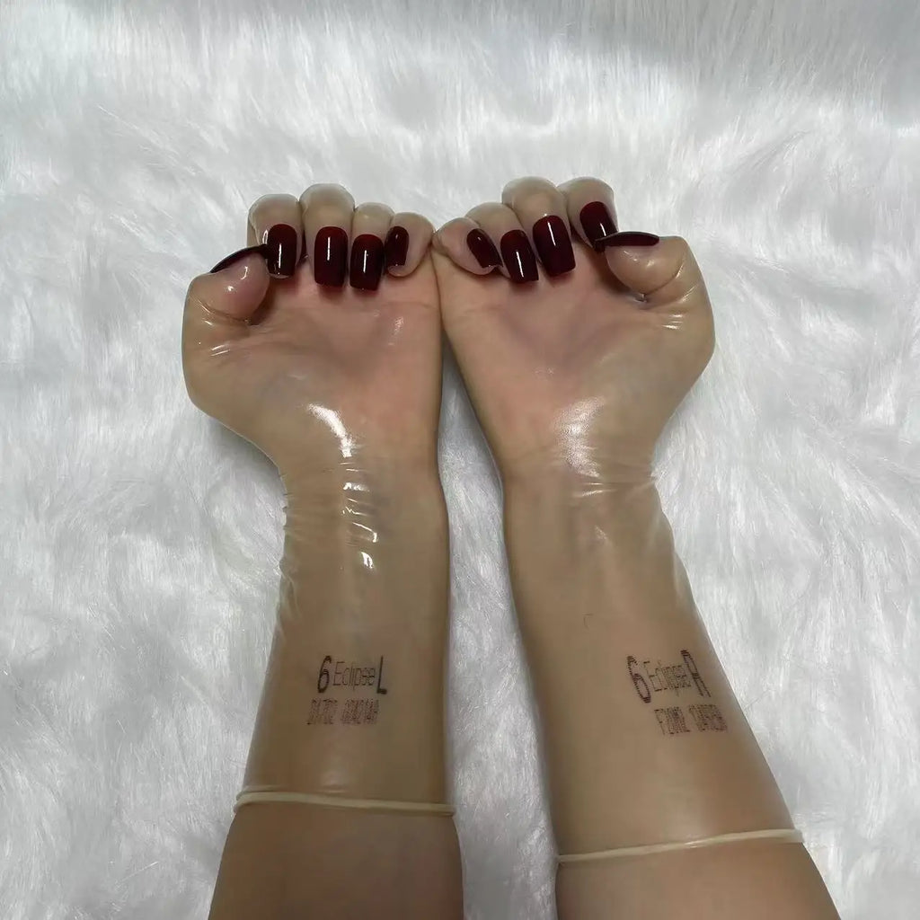 A pair of Malaysian latex material supper thin transparent shiny shiny male to female latex medium long gloves with nail service